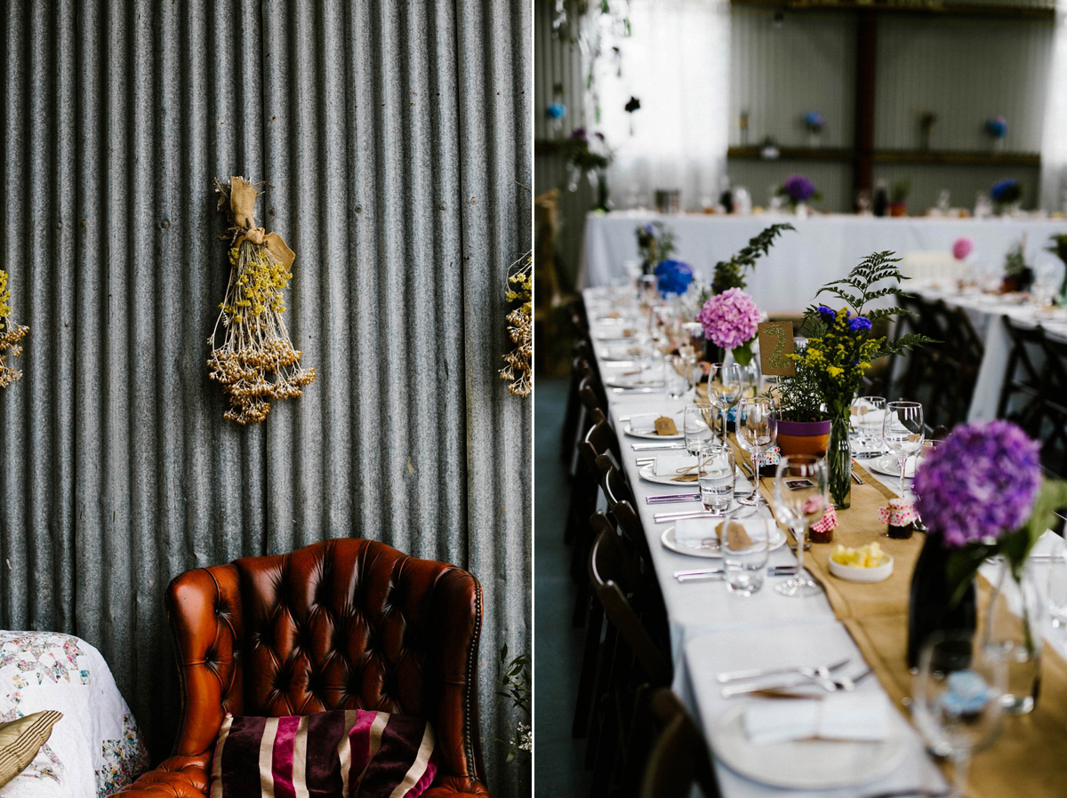 Kirsty wore a Rue de Seine gown from Leonie C. Bridal boutique in Brighton. Her handmade, Summer wedding took place in a Game of Thrones venue in Downpatrick. It was filled with floral chandeliers. Photography by Honey and the Moon.