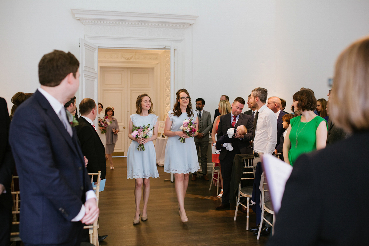 Faye wore a long sleeved, backless Self Portrait dress for her fuss-free, chic and modern wedding at the ICA in London. Photography by Emma Case.