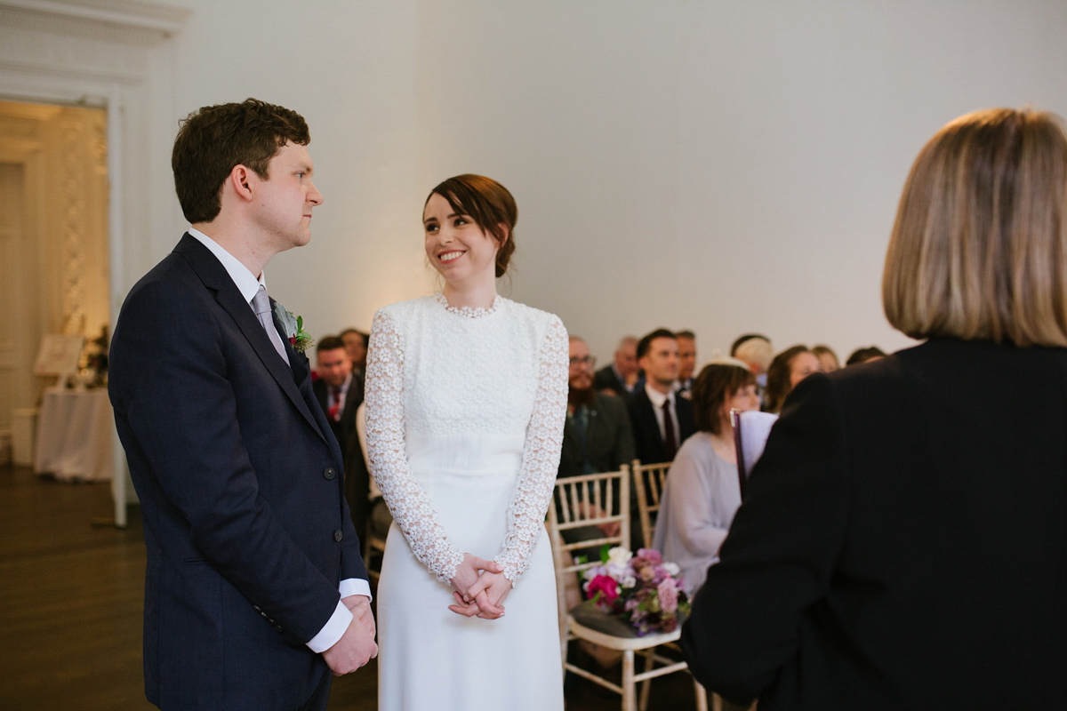 Faye wore a long sleeved, backless Self Portrait dress for her fuss-free, chic and modern wedding at the ICA in London. Photography by Emma Case.