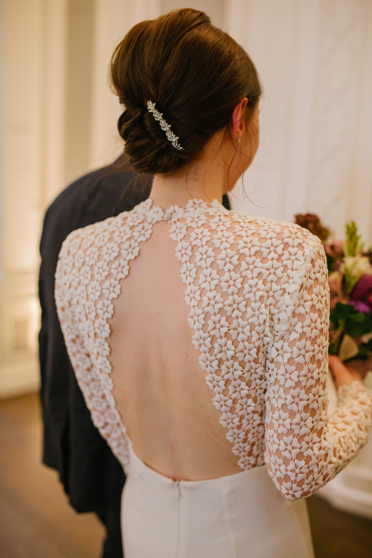 Faye wore a long sleeved, backless Self Portrait dress for her fuss-free, chic and modern wedding at the ICA in London. Photography by Emma Case.