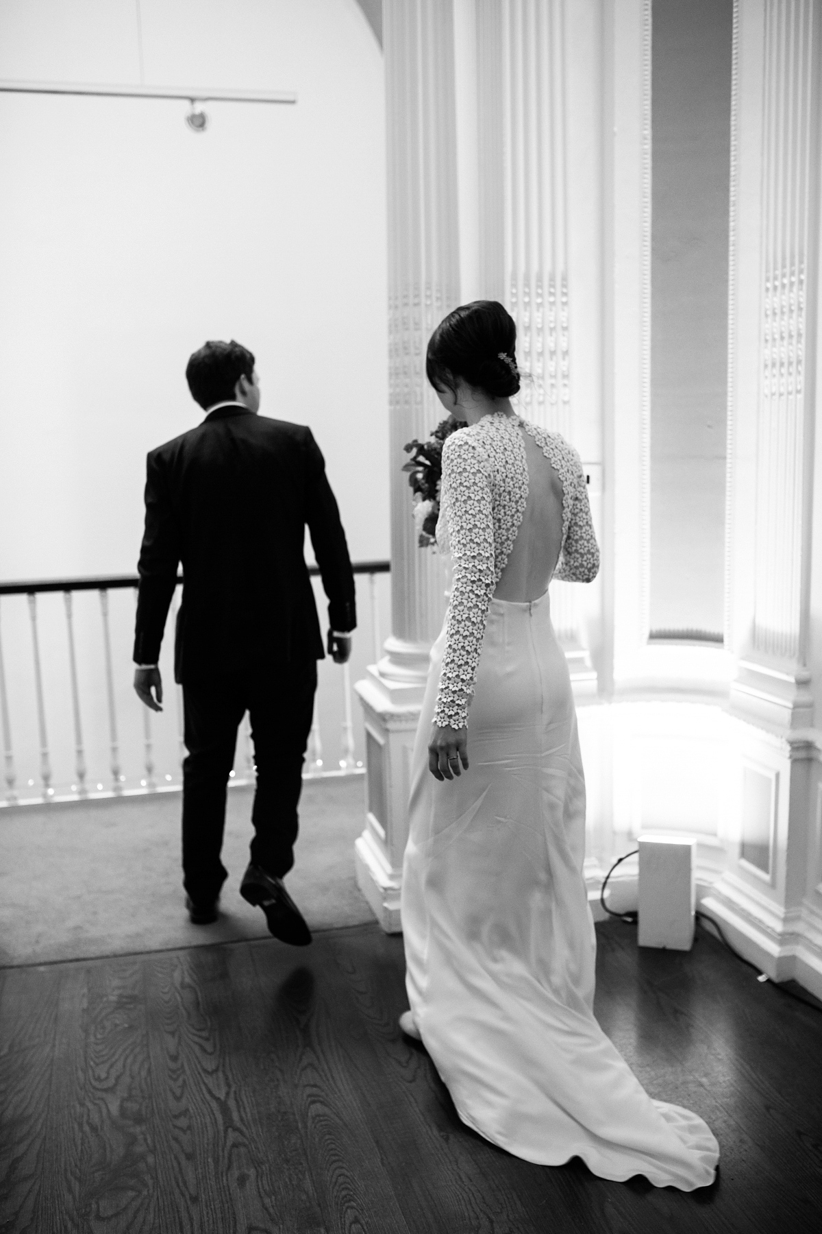 Faye wore a long sleeved, backless Self Portrait dress for her fuss-free, chic and modern wedding at the ICA in London. Photography by Emma Case.