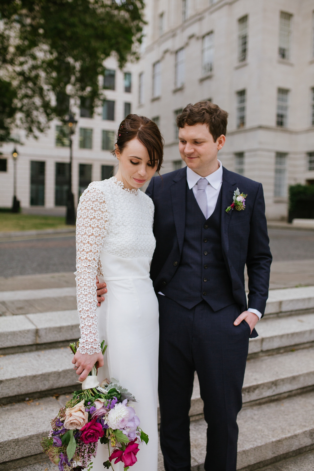 Faye wore a long sleeved, backless Self Portrait dress for her fuss-free, chic and modern wedding at the ICA in London. Photography by Emma Case.