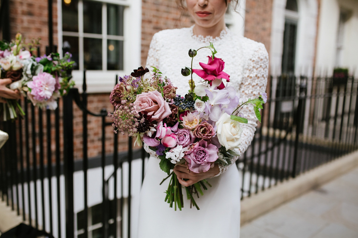 Faye wore a long sleeved, backless Self Portrait dress for her fuss-free, chic and modern wedding at the ICA in London. Photography by Emma Case.