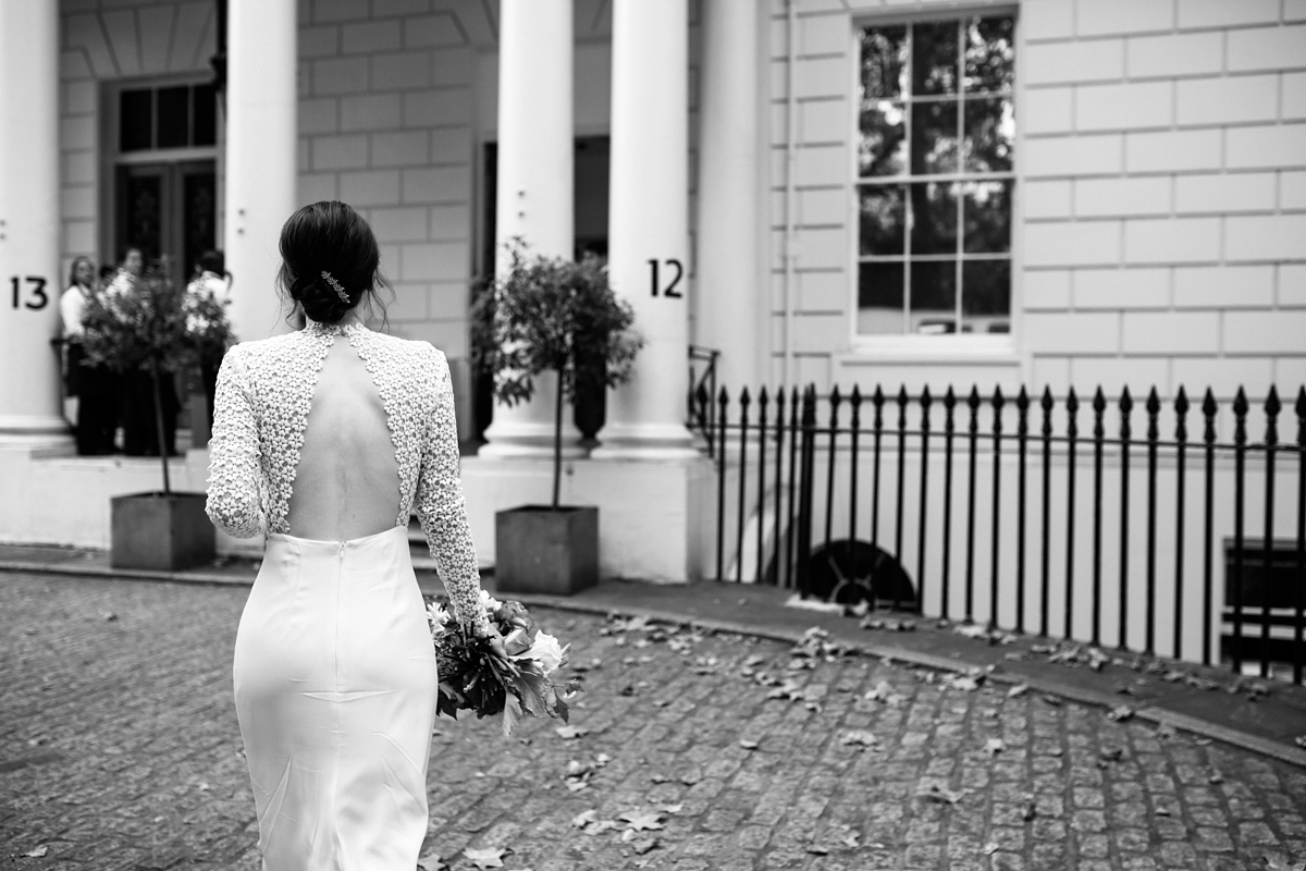 Faye wore a long sleeved, backless Self Portrait dress for her fuss-free, chic and modern wedding at the ICA in London. Photography by Emma Case.