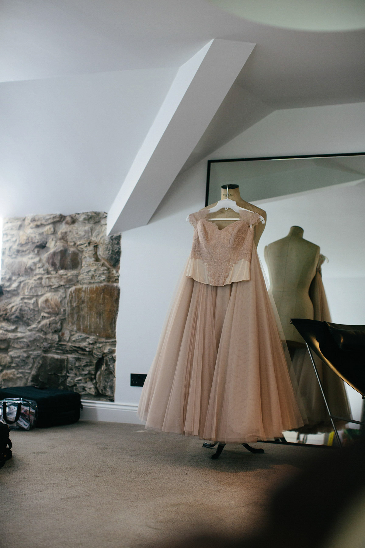 Jillian wore a dusky pink 2-piece dress by Watters for her romantic outdoor wedding ceremony in Scotland. Captured by MIrrorbox Photography.