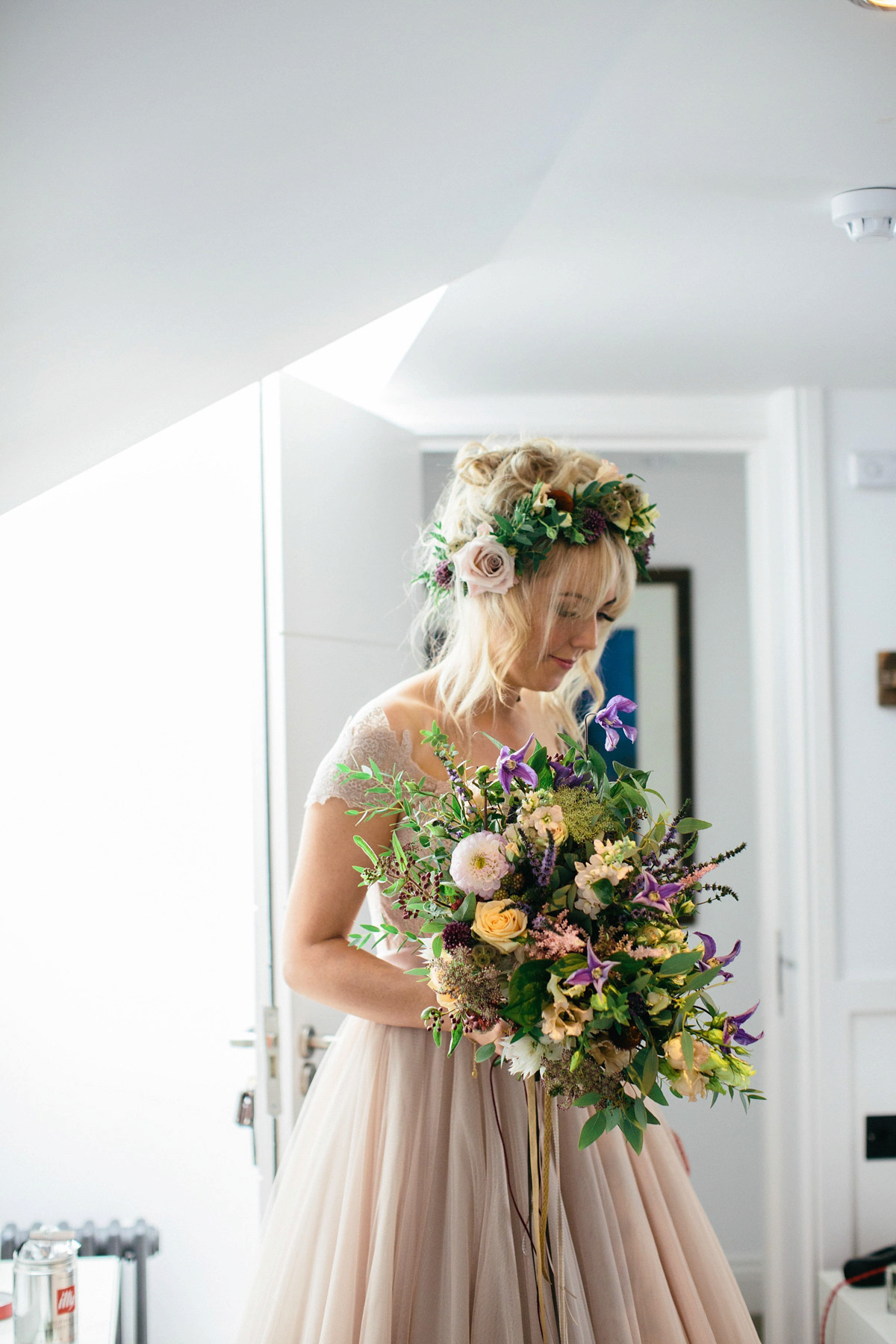 Jillian wore a dusky pink 2-piece dress by Watters for her romantic outdoor wedding ceremony in Scotland. Captured by MIrrorbox Photography.