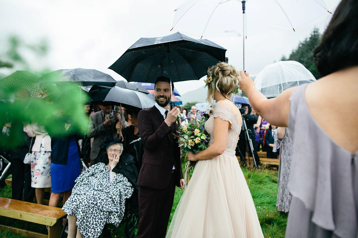 Jillian wore a dusky pink 2-piece dress by Watters for her romantic outdoor wedding ceremony in Scotland. Captured by MIrrorbox Photography.