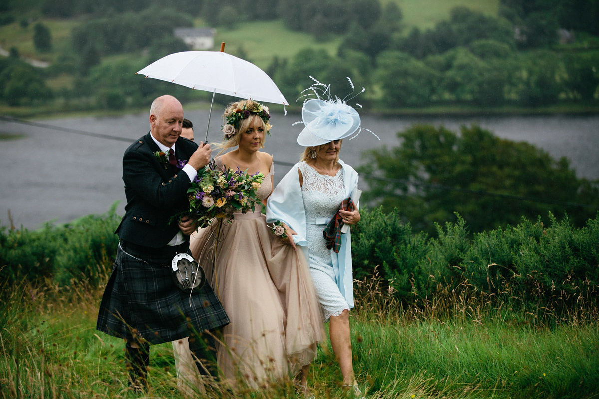 Jillian wore a dusky pink 2-piece dress by Watters for her romantic outdoor wedding ceremony in Scotland. Captured by MIrrorbox Photography.