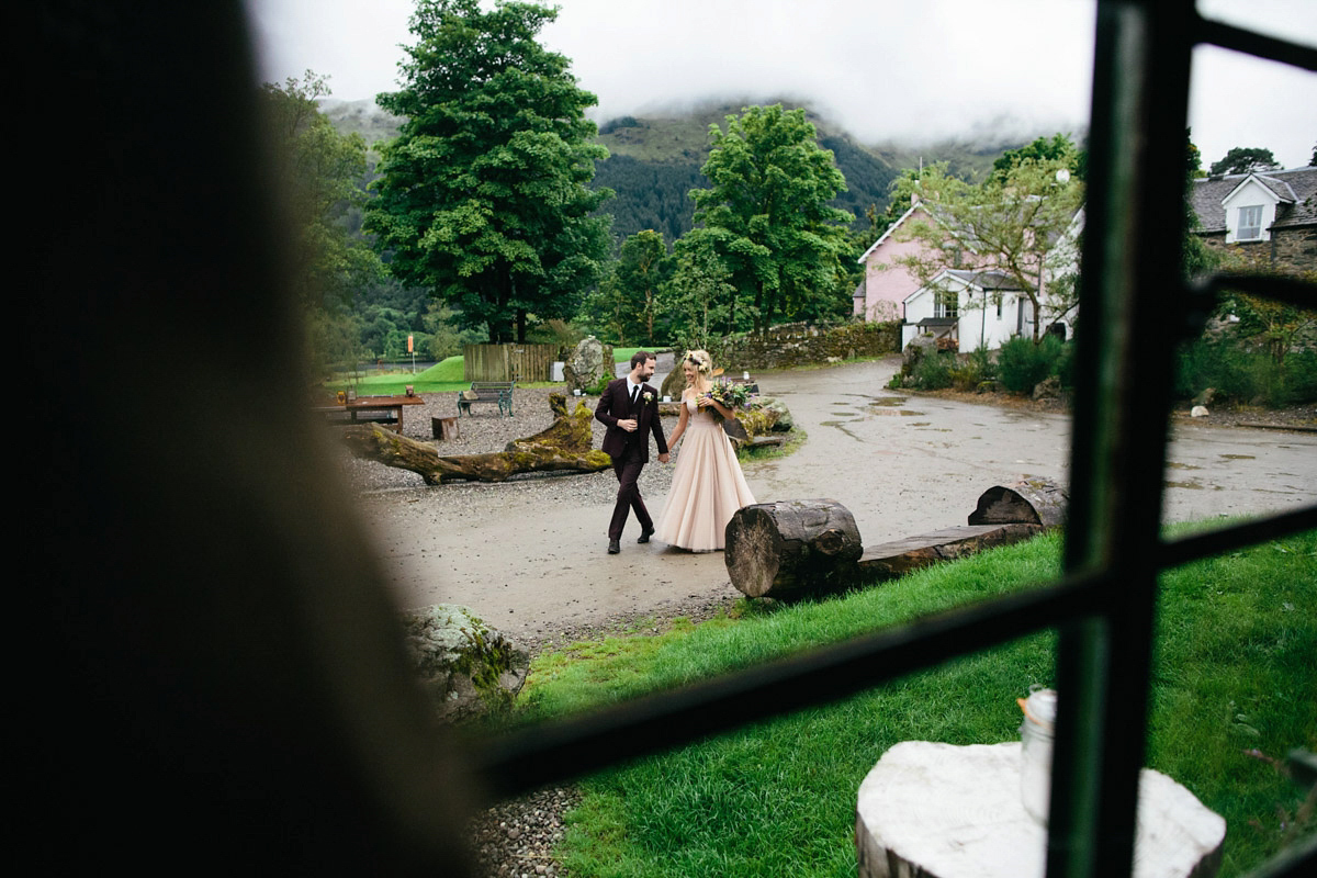 Jillian wore a dusky pink 2-piece dress by Watters for her romantic outdoor wedding ceremony in Scotland. Captured by MIrrorbox Photography.