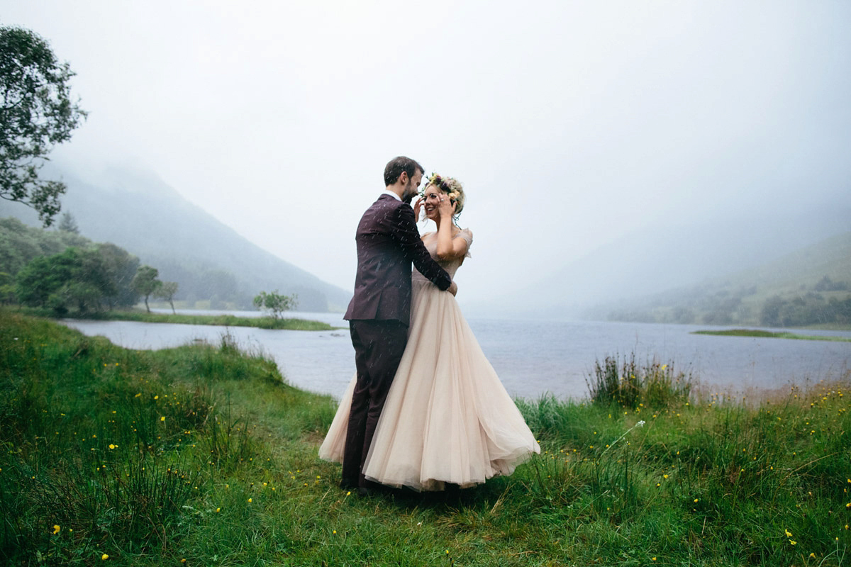 Jillian wore a dusky pink 2-piece dress by Watters for her romantic outdoor wedding ceremony in Scotland. Captured by MIrrorbox Photography.