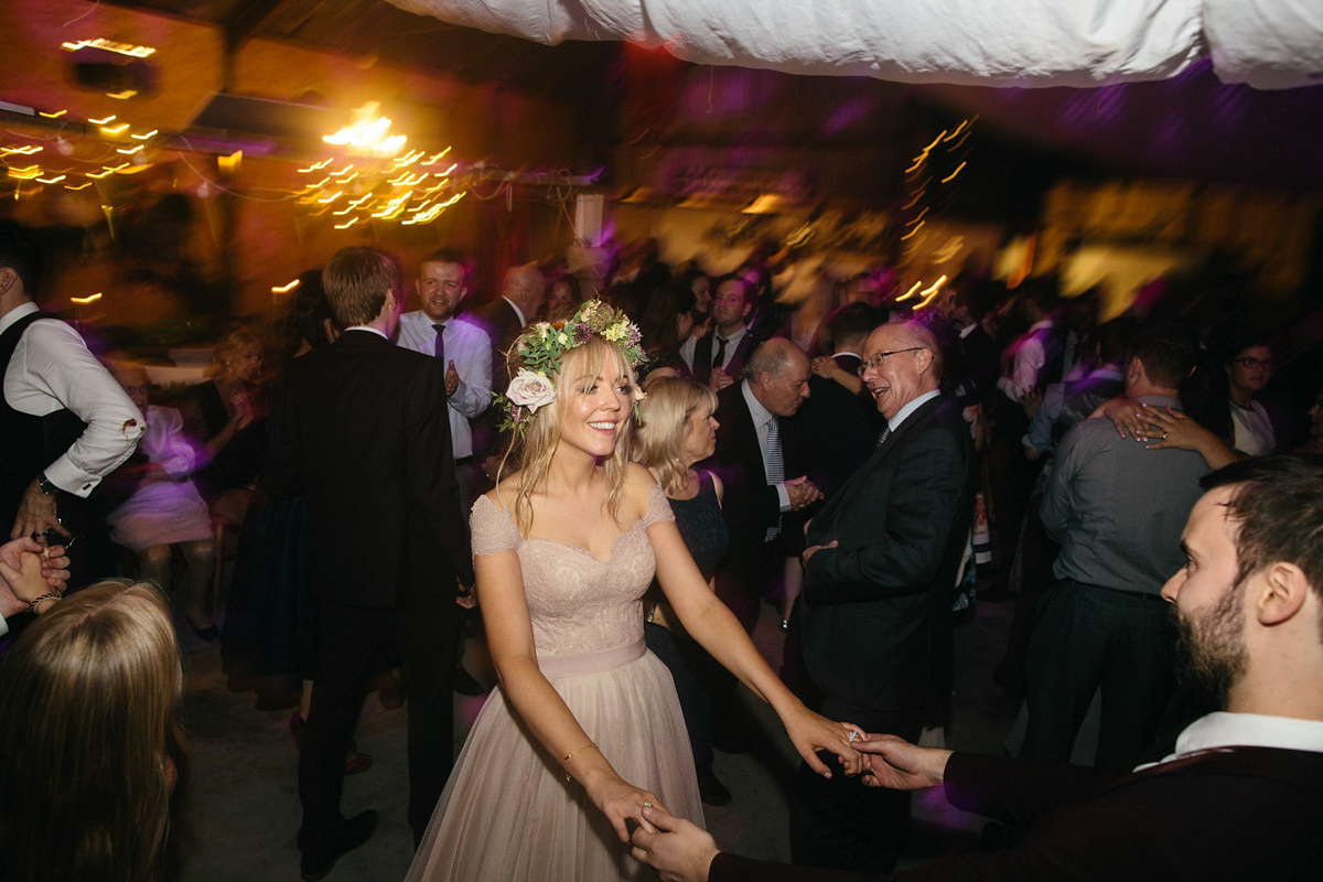 Jillian wore a dusky pink 2-piece dress by Watters for her romantic outdoor wedding ceremony in Scotland. Captured by MIrrorbox Photography.