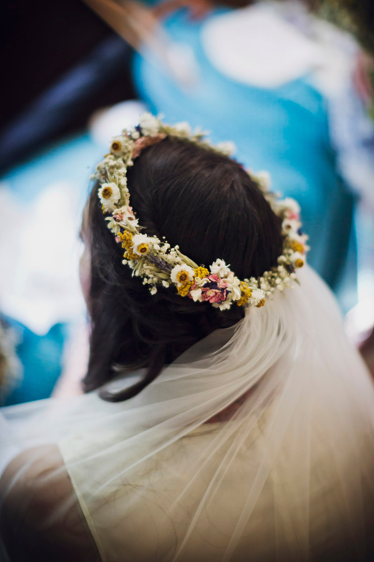 Etsy illustrator Kerris wore an ASOS wedding dress for her boho and handmade village hall wedding. We love the comic book confetti! Photography by Mark Tattersall.