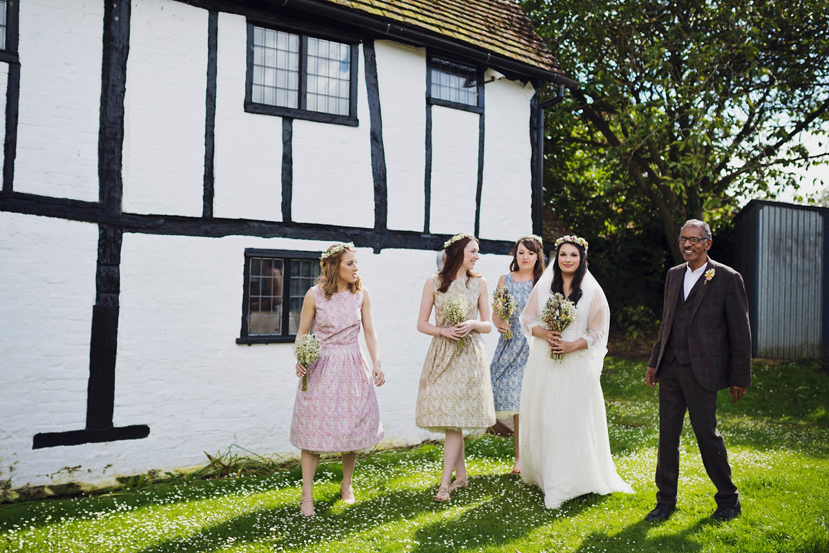 Etsy illustrator Kerris wore an ASOS wedding dress for her boho and handmade village hall wedding. We love the comic book confetti! Photography by Mark Tattersall.