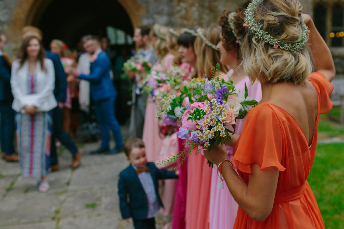 Elizabeth wore a Laure de Sagazan gown for her romantic, fun and colourful Somerset wedding. Photography by The Retreat.