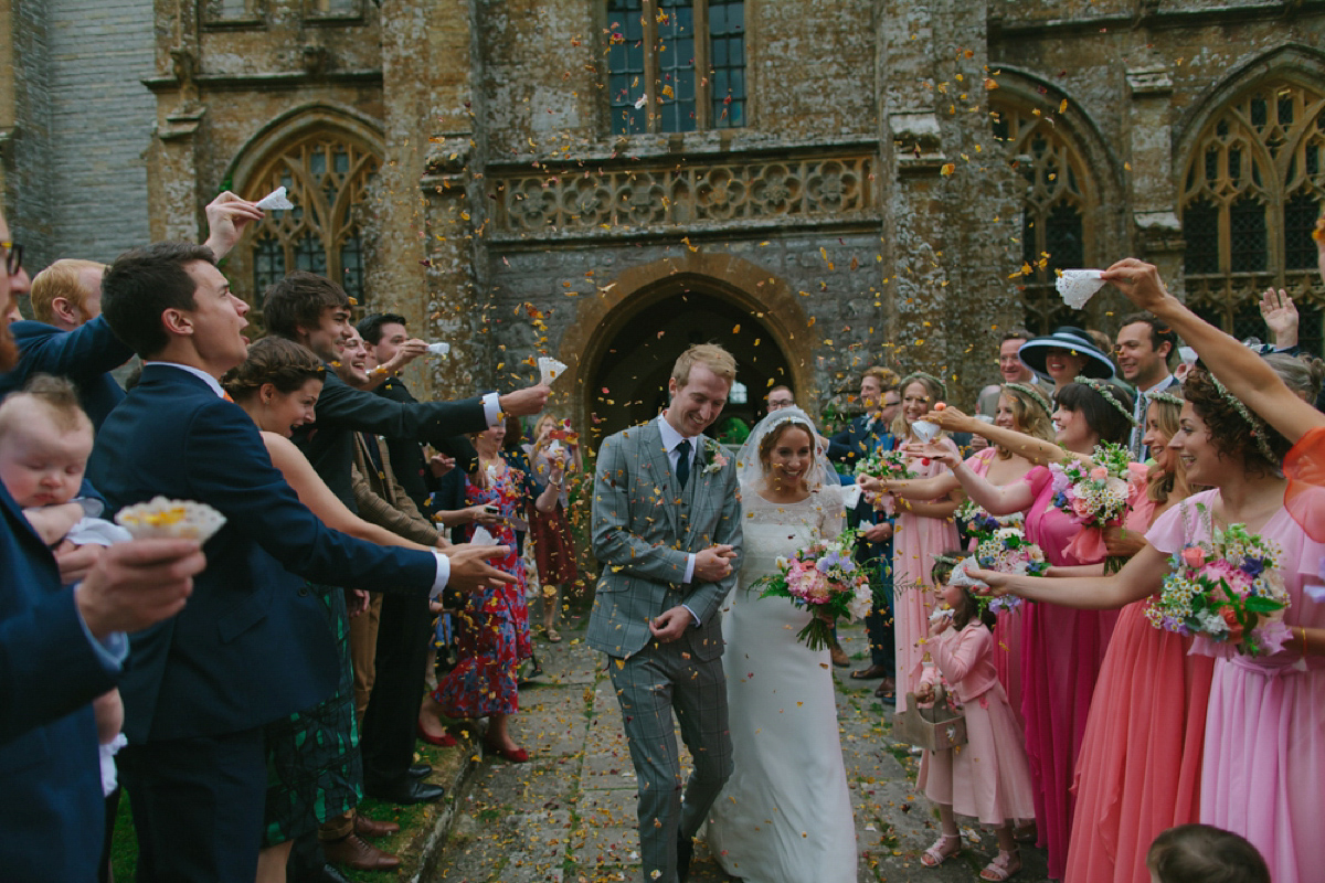 Elizabeth wore a Laure de Sagazan gown for her romantic, fun and colourful Somerset wedding. Photography by The Retreat.