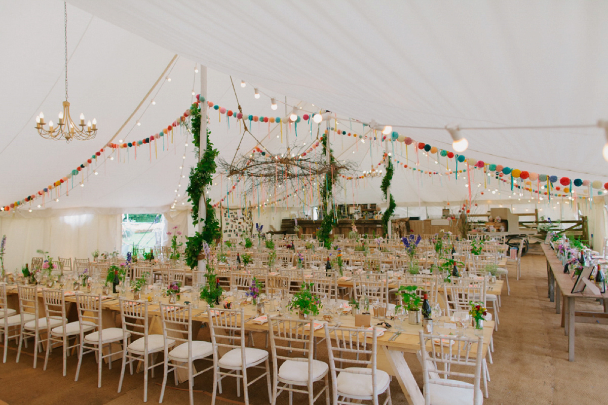 Elizabeth wore a Laure de Sagazan gown for her romantic, fun and colourful Somerset wedding. Photography by The Retreat.