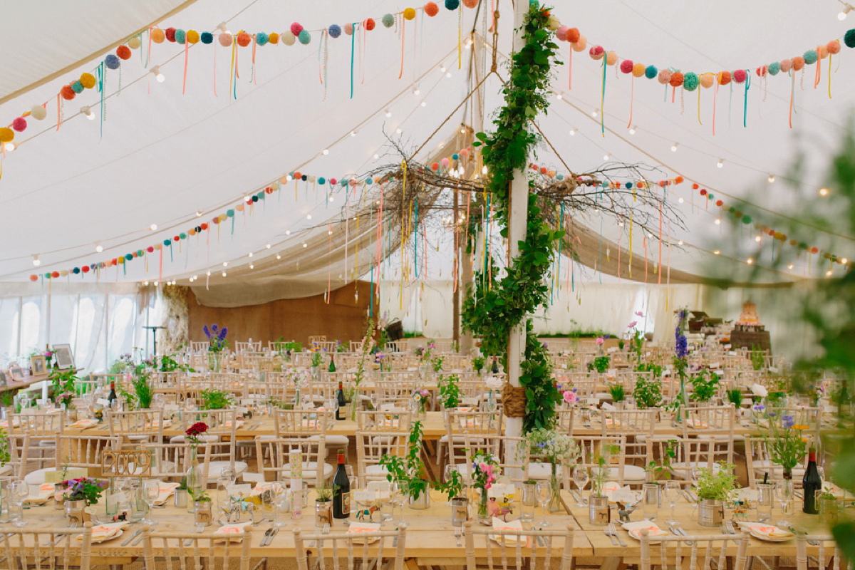 Elizabeth wore a Laure de Sagazan gown for her romantic, fun and colourful Somerset wedding. Photography by The Retreat.