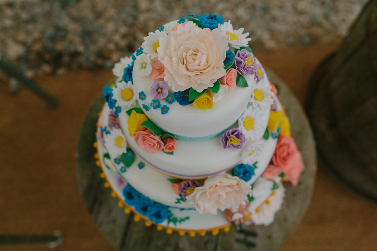 Elizabeth wore a Laure de Sagazan gown for her romantic, fun and colourful Somerset wedding. Photography by The Retreat.