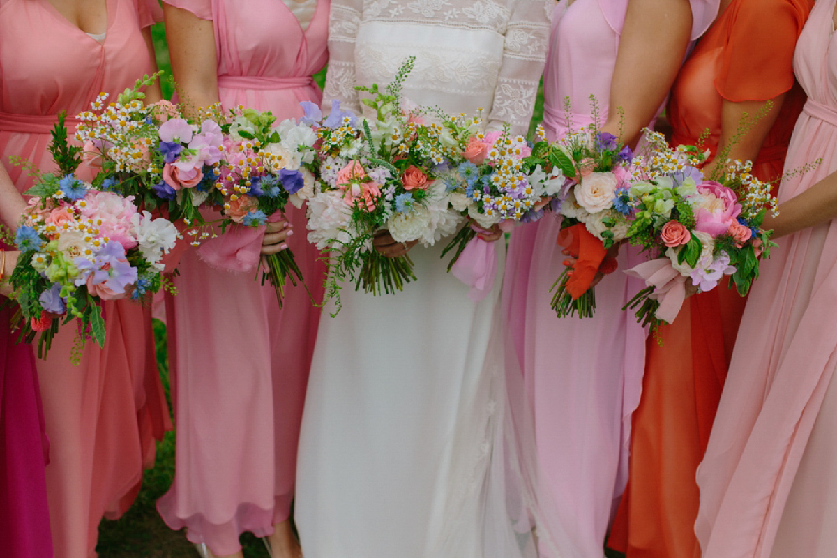 Elizabeth wore a Laure de Sagazan gown for her romantic, fun and colourful Somerset wedding. Photography by The Retreat.