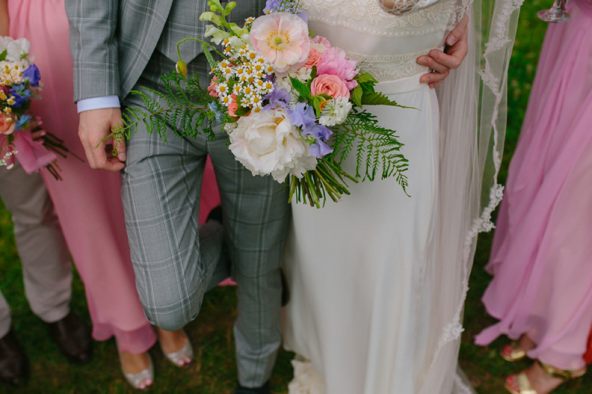 Elizabeth wore a Laure de Sagazan gown for her romantic, fun and colourful Somerset wedding. Photography by The Retreat.