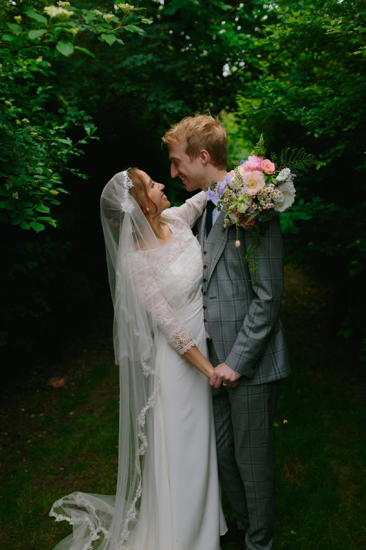 Elizabeth wore a Laure de Sagazan gown for her romantic, fun and colourful Somerset wedding. Photography by The Retreat.