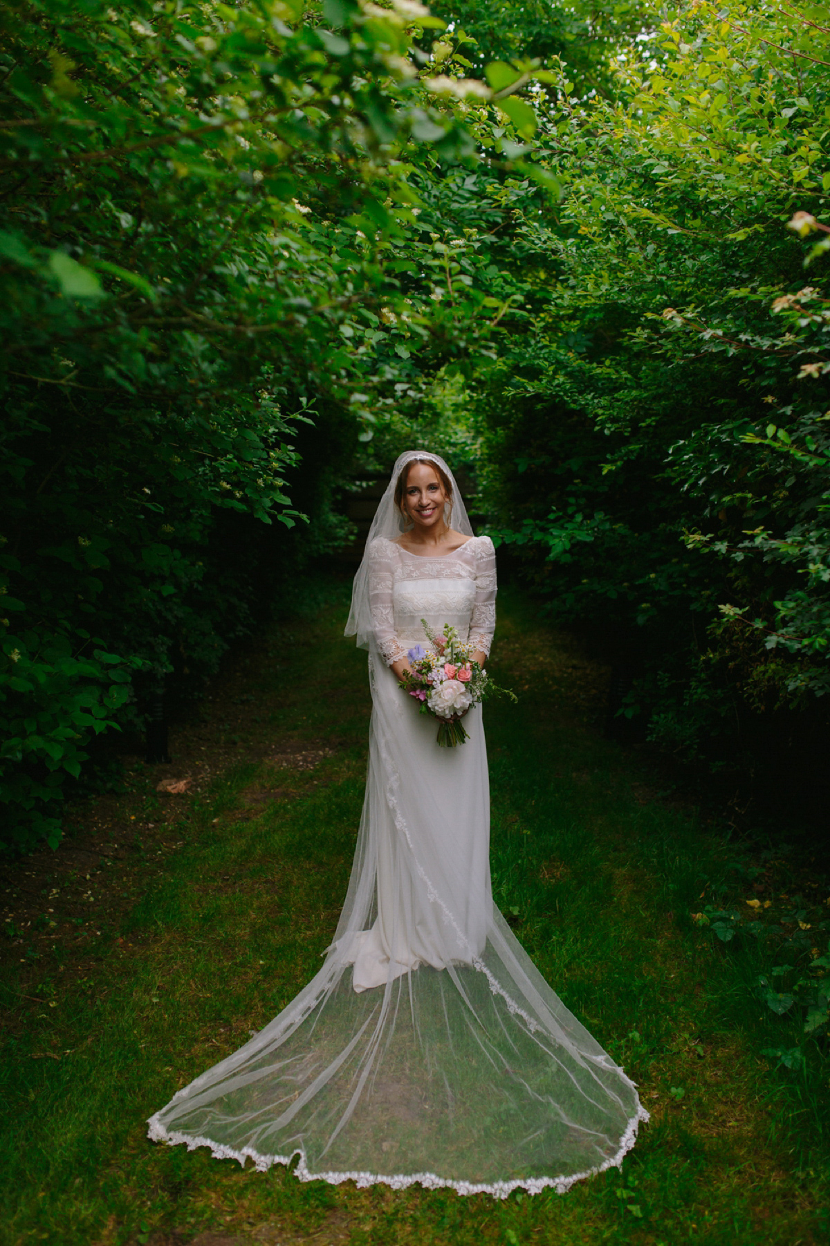 Elizabeth wore a Laure de Sagazan gown for her romantic, fun and colourful Somerset wedding. Photography by The Retreat.