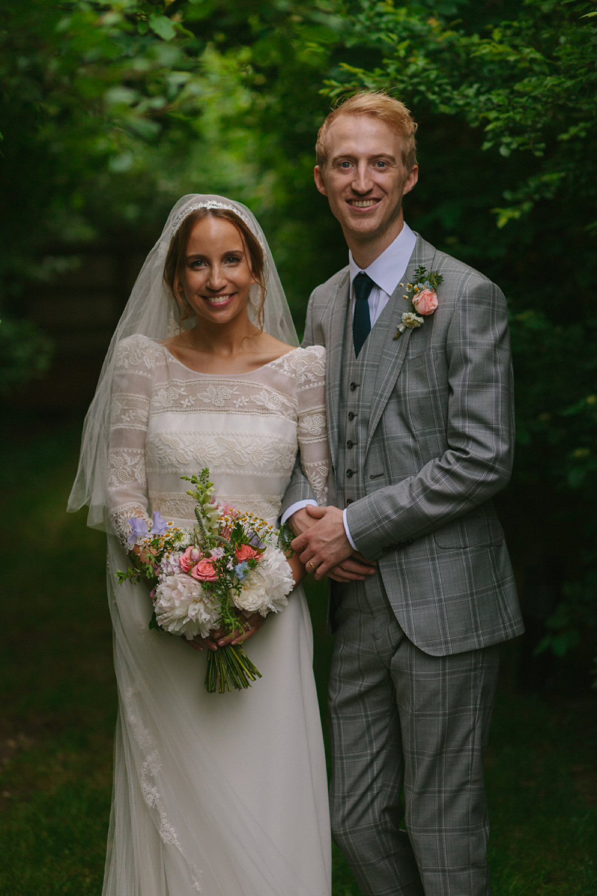 Elizabeth wore a Laure de Sagazan gown for her romantic, fun and colourful Somerset wedding. Photography by The Retreat.