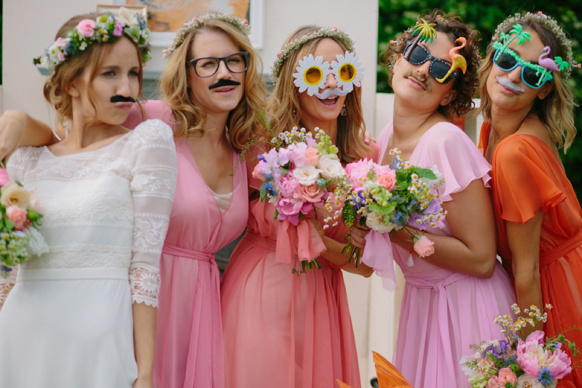 Elizabeth wore a Laure de Sagazan gown for her romantic, fun and colourful Somerset wedding. Photography by The Retreat.