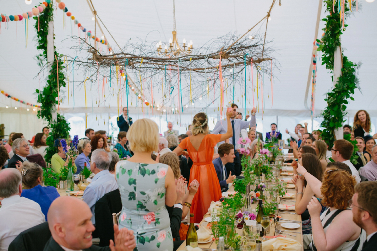 Elizabeth wore a Laure de Sagazan gown for her romantic, fun and colourful Somerset wedding. Photography by The Retreat.