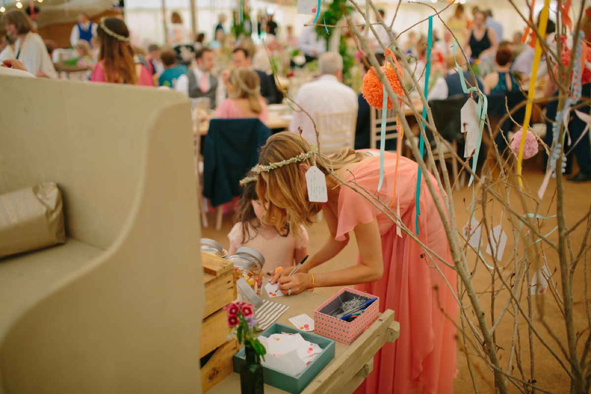 Elizabeth wore a Laure de Sagazan gown for her romantic, fun and colourful Somerset wedding. Photography by The Retreat.