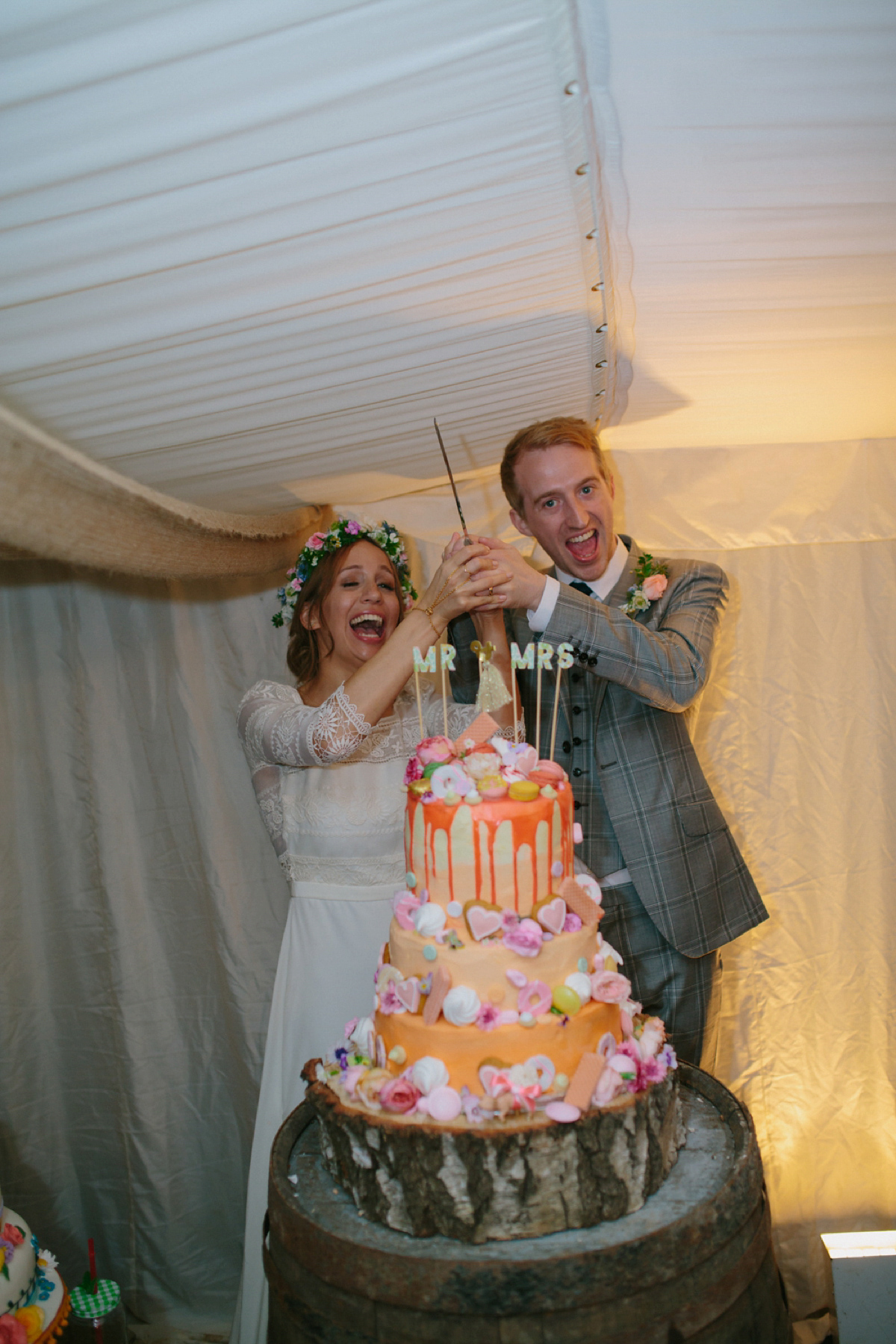 Elizabeth wore a Laure de Sagazan gown for her romantic, fun and colourful Somerset wedding. Photography by The Retreat.