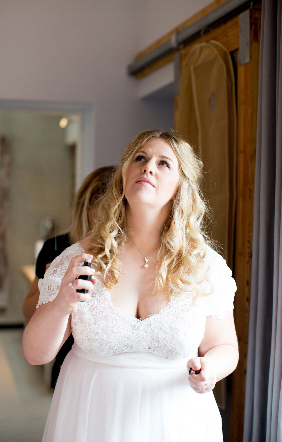 Victoria wore a Cymbeline Paris gown from Mirror Mirror Bridal in Islington for her relaxed and romantic country wedding. The reception was styled like a Green Tavern with long banquet tables. Photography by Helen Cawte.