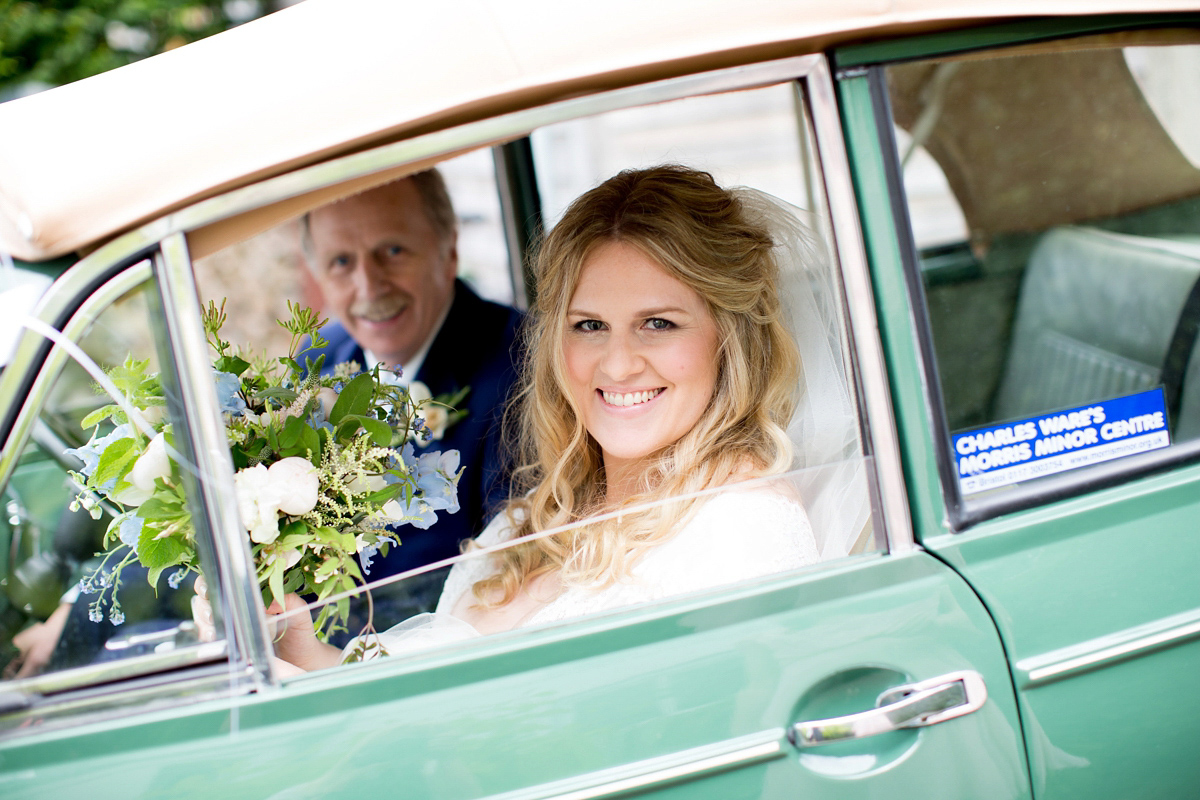 Victoria wore a Cymbeline Paris gown from Mirror Mirror Bridal in Islington for her relaxed and romantic country wedding. The reception was styled like a Green Tavern with long banquet tables. Photography by Helen Cawte.