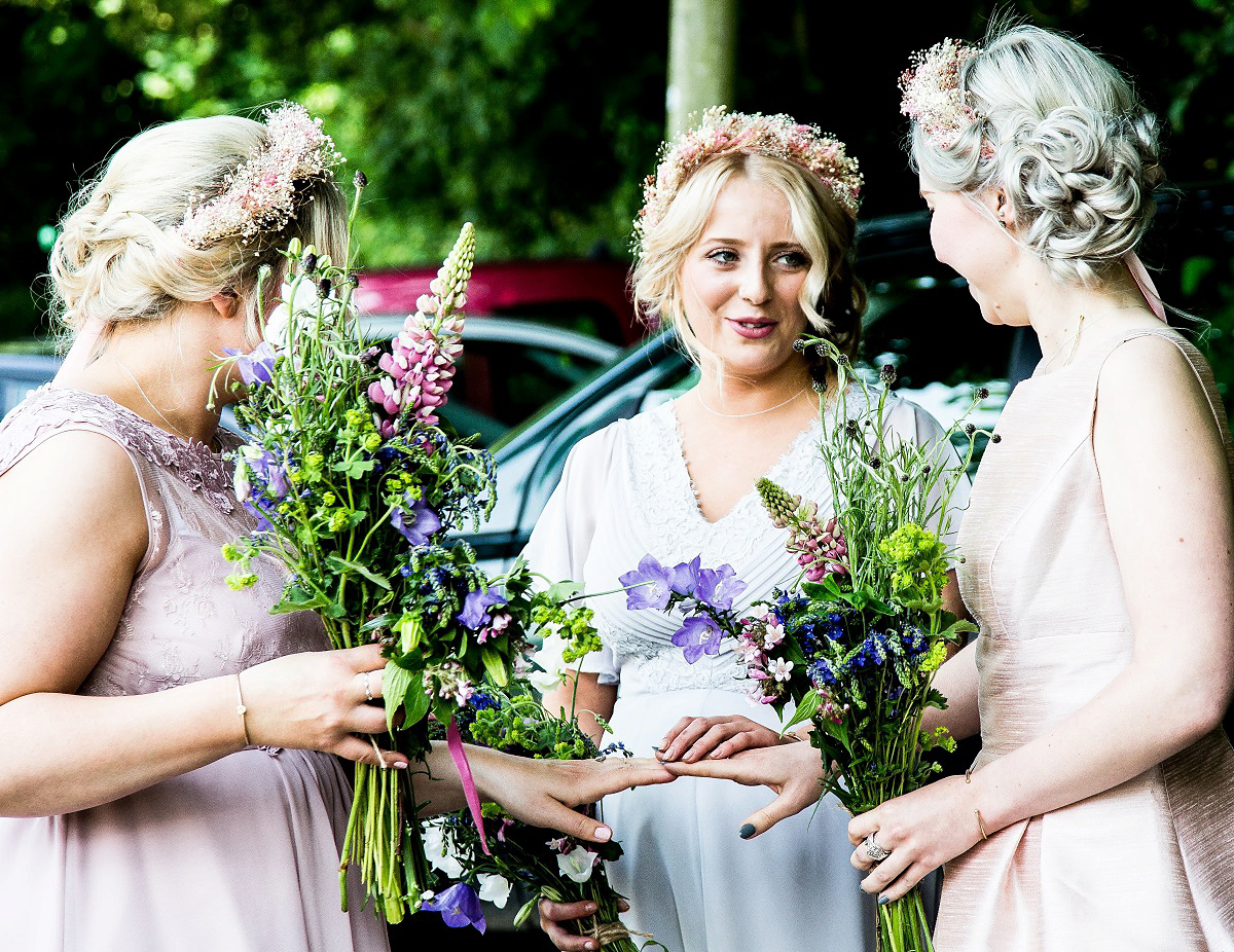 Layla wore a 1930's vintage dress for her summer country marquee wedding. Photography by Hannah Betts.