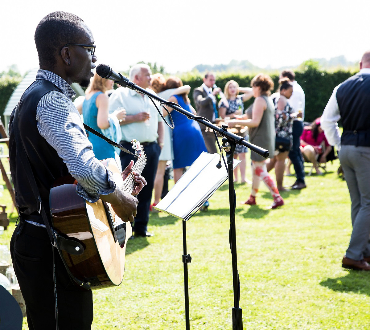 Layla wore a 1930's vintage dress for her summer country marquee wedding. Photography by Hannah Betts.