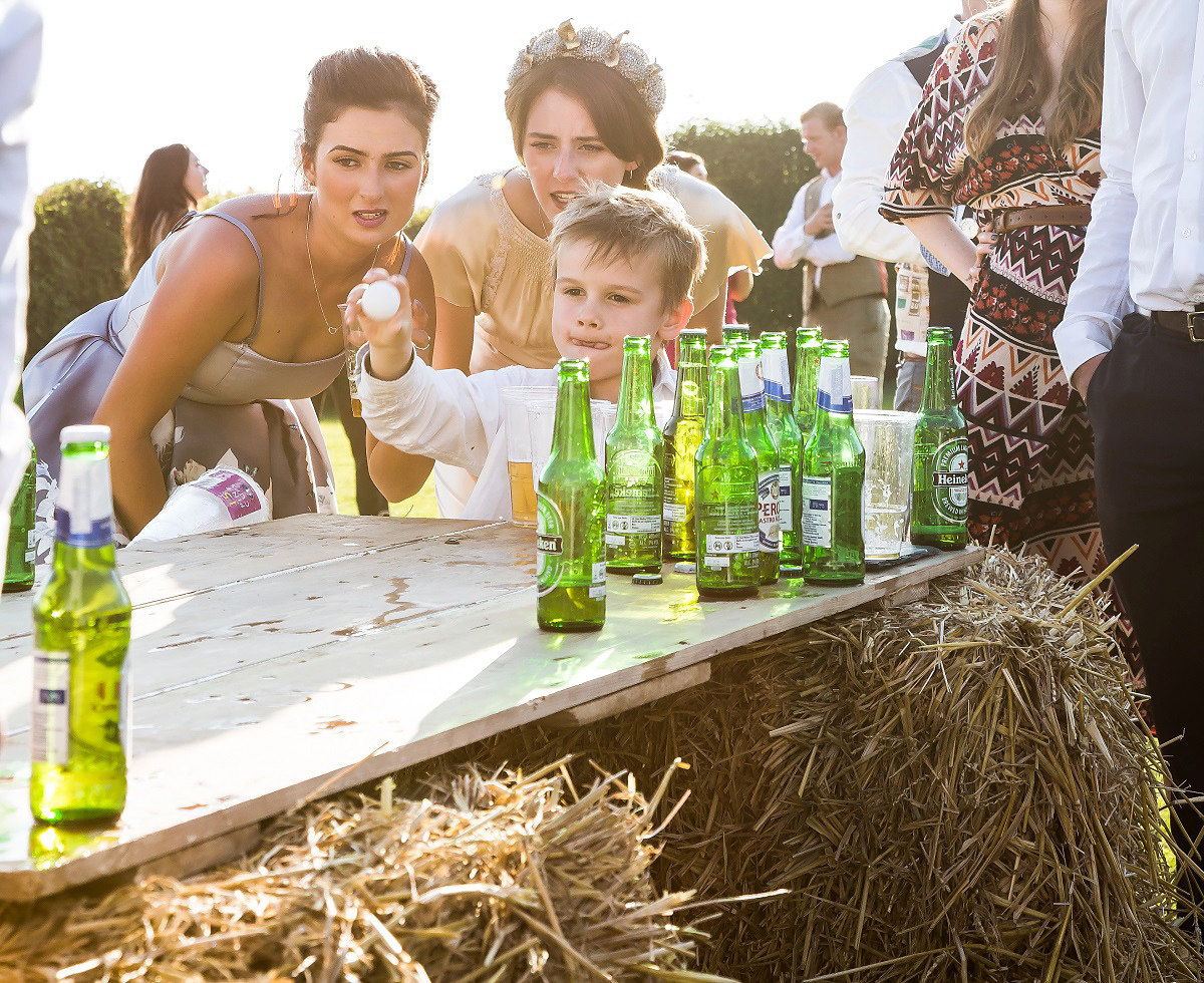 Layla wore a 1930's vintage dress for her summer country marquee wedding. Photography by Hannah Betts.