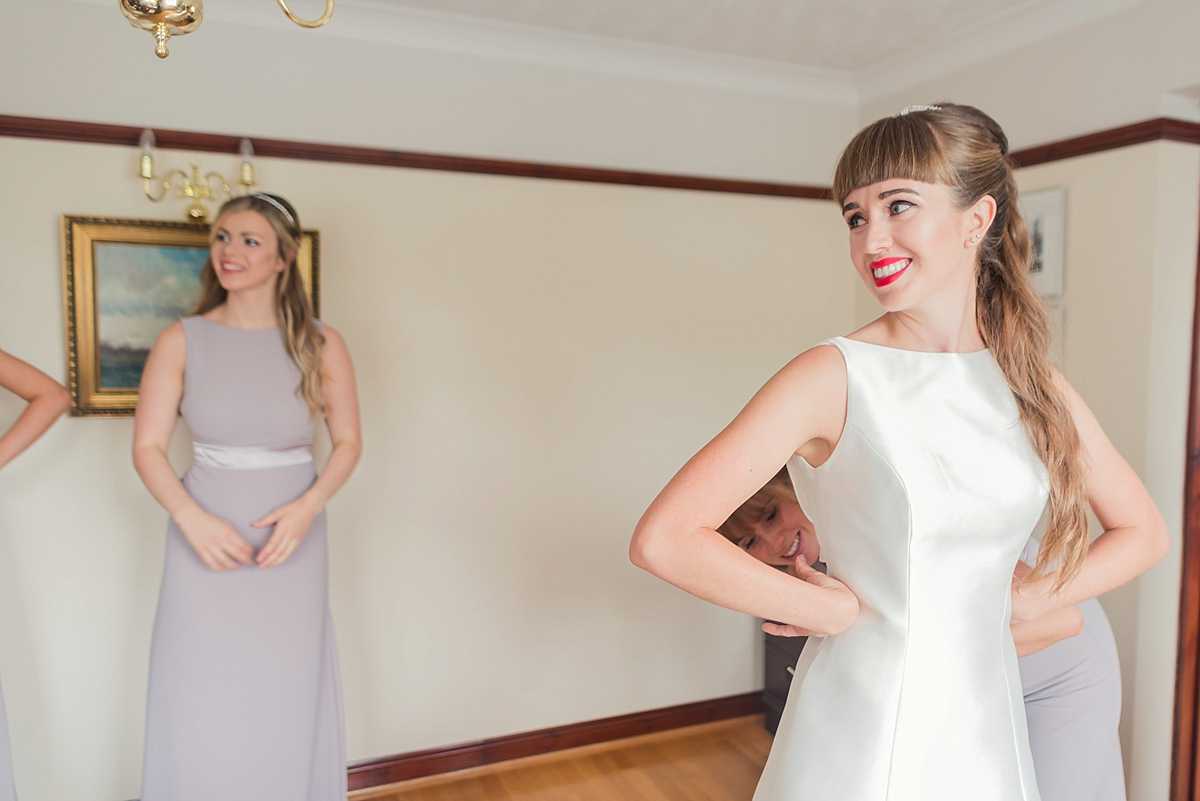 Lyndsey wore a Pronovias gown for her cycling inspired Suffolk Village wedding. Photography by Kerrie Mitchell.