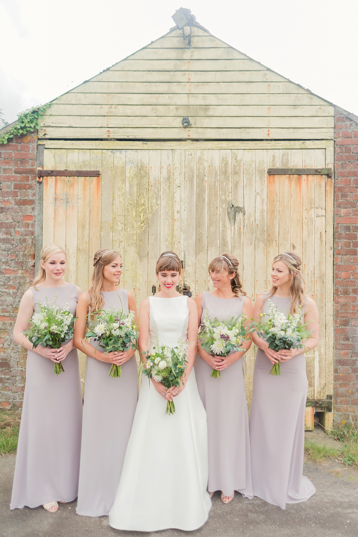 Lyndsey wore a Pronovias gown for her cycling inspired Suffolk Village wedding. Photography by Kerrie Mitchell.