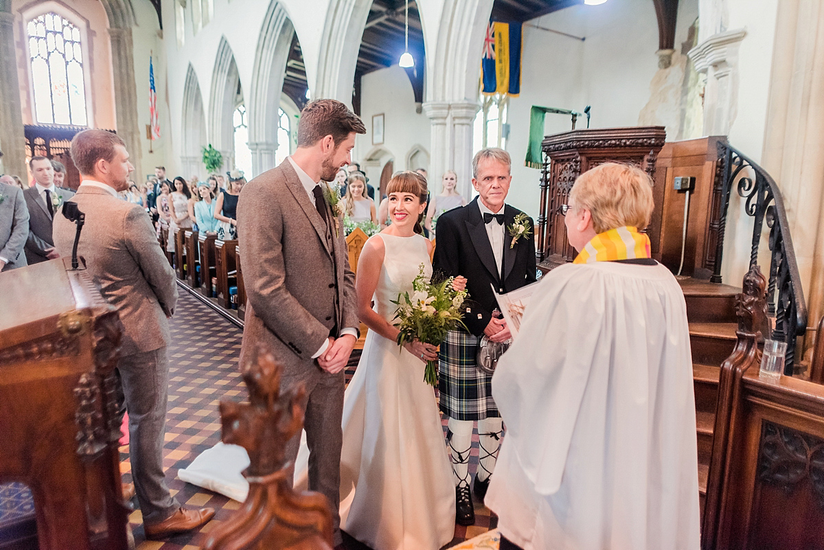 Lyndsey wore a Pronovias gown for her cycling inspired Suffolk Village wedding. Photography by Kerrie Mitchell.