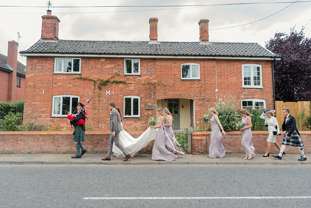 Lyndsey wore a Pronovias gown for her cycling inspired Suffolk Village wedding. Photography by Kerrie Mitchell.