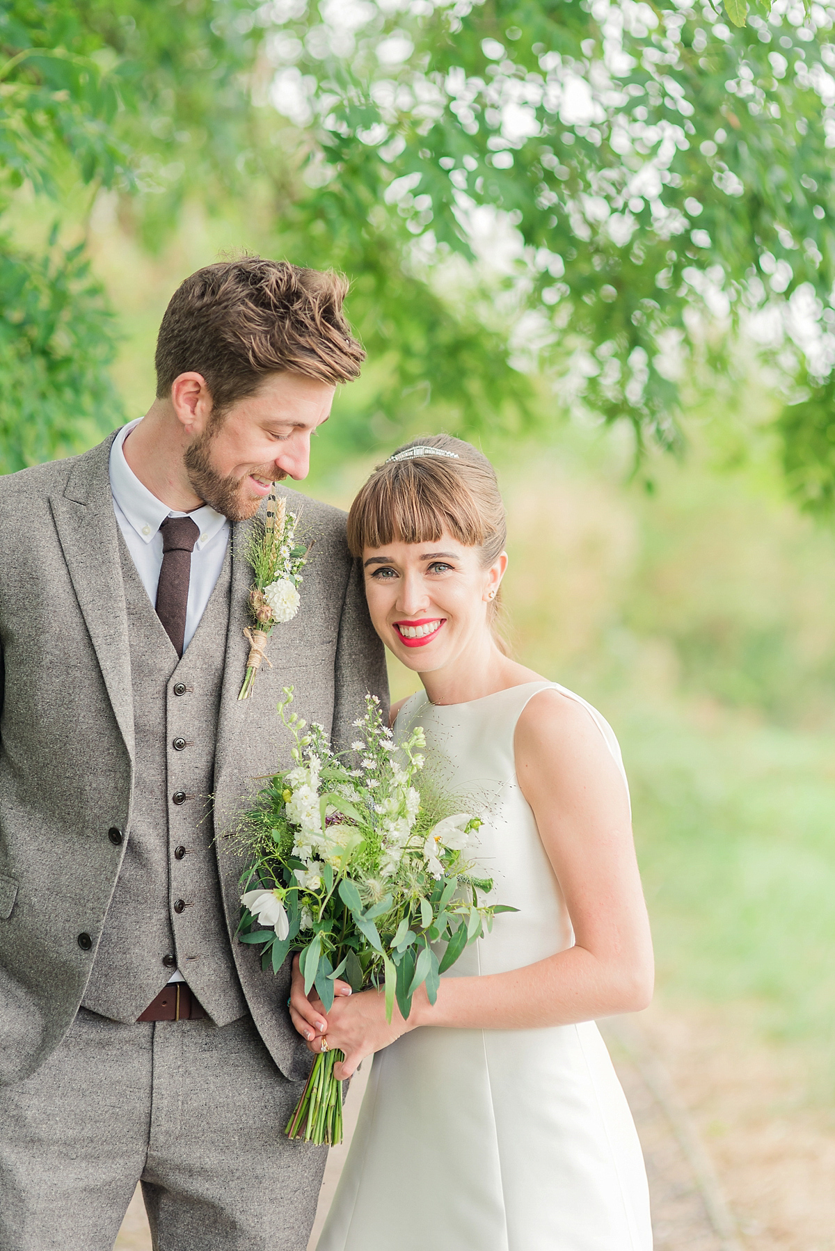 Lyndsey wore a Pronovias gown for her cycling inspired Suffolk Village wedding. Photography by Kerrie Mitchell.