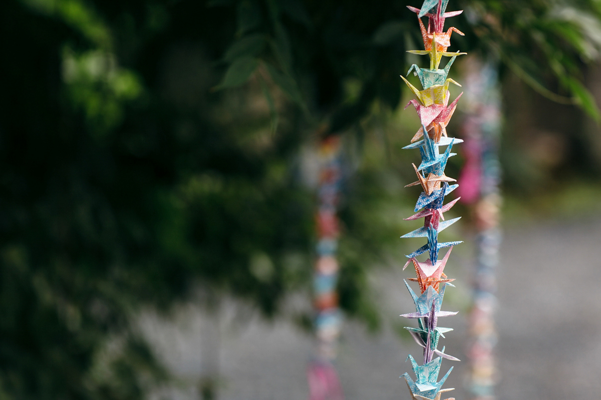 Emily wore a Needle & Thread dress for her colourful, balloon and glitter filled wedding at Coombe Trenchard. Images by Freckle Photography.