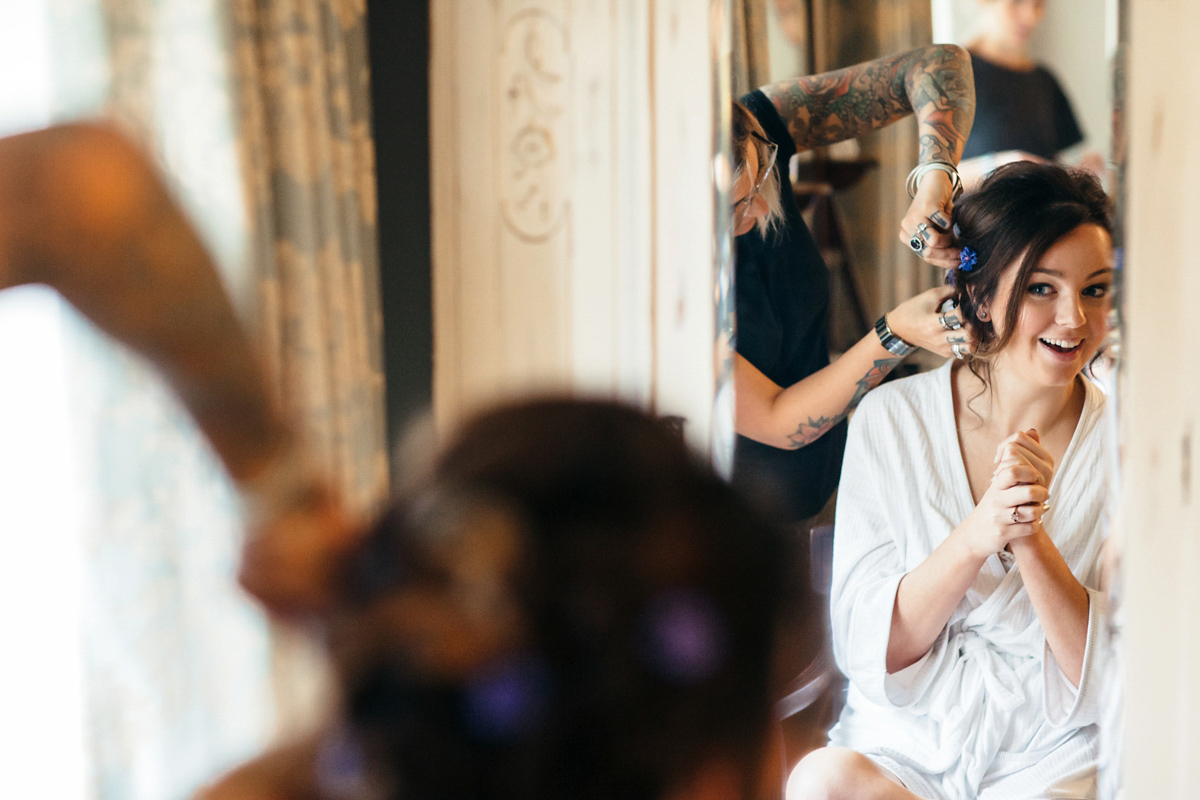 Emily wore a Needle & Thread dress for her colourful, balloon and glitter filled wedding at Coombe Trenchard. Images by Freckle Photography.