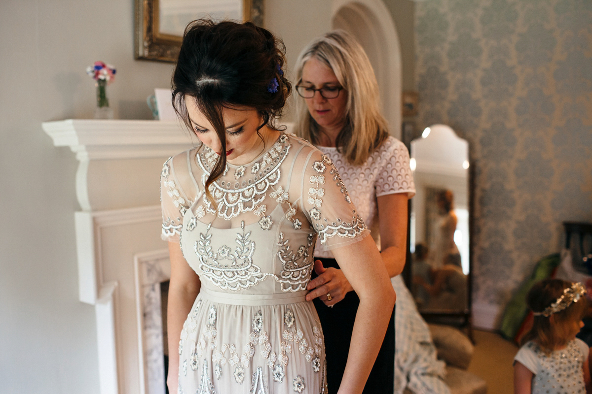 Emily wore a Needle & Thread dress for her colourful, balloon and glitter filled wedding at Coombe Trenchard. Images by Freckle Photography.