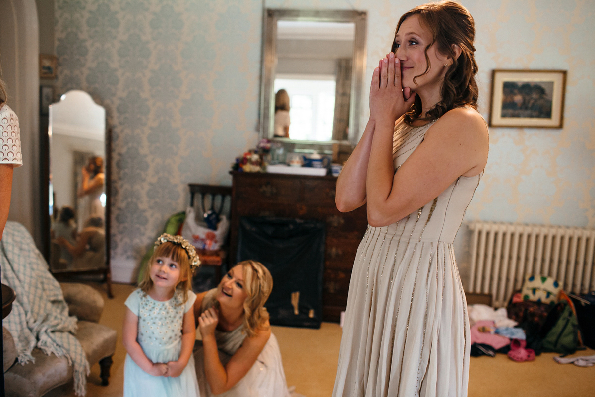 Emily wore a Needle & Thread dress for her colourful, balloon and glitter filled wedding at Coombe Trenchard. Images by Freckle Photography.