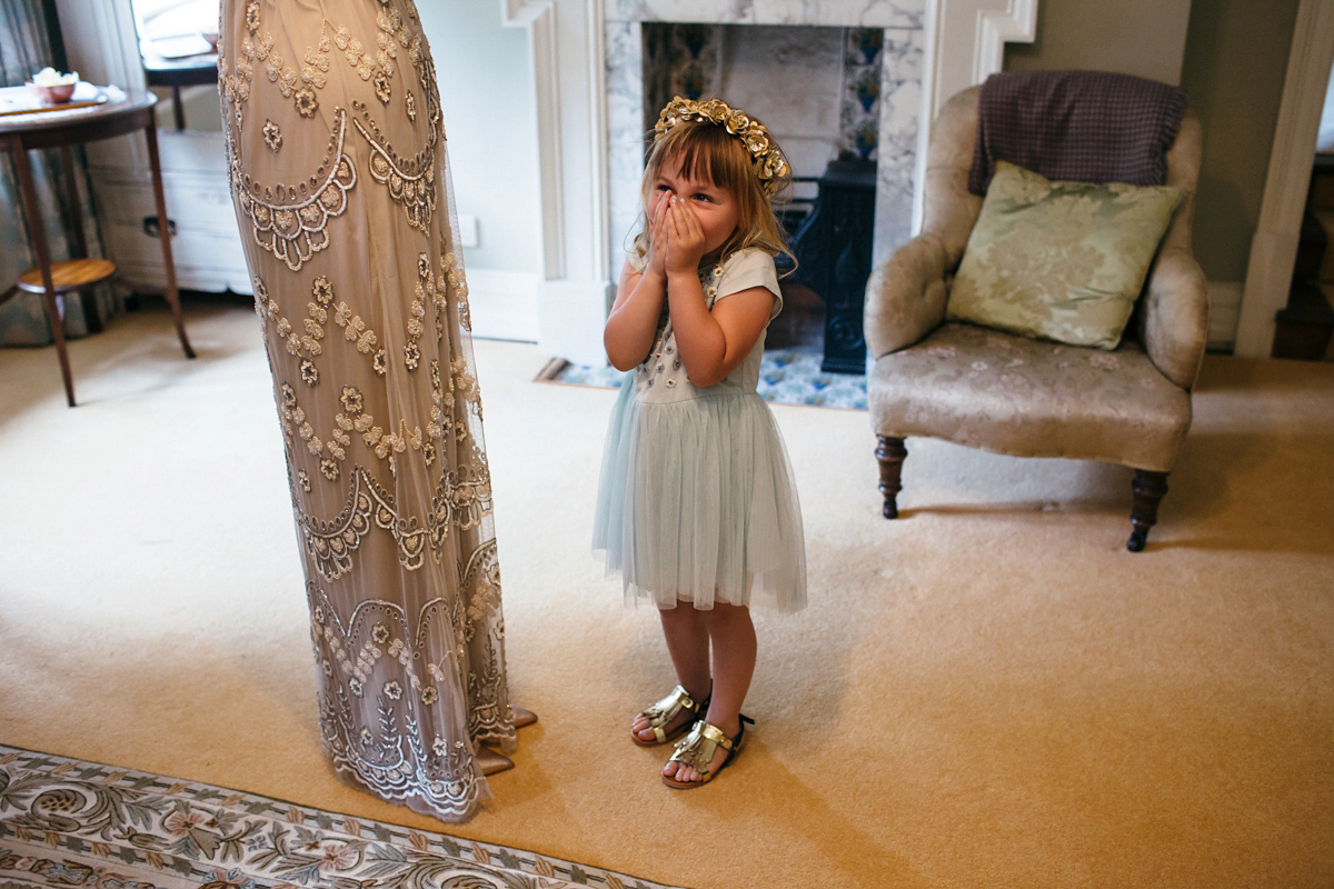 Emily wore a Needle & Thread dress for her colourful, balloon and glitter filled wedding at Coombe Trenchard. Images by Freckle Photography.