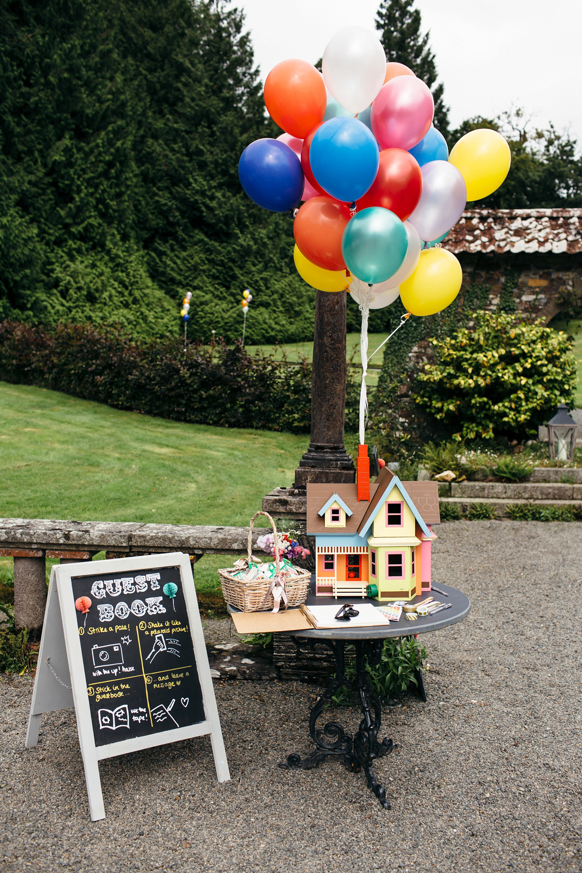 Emily wore a Needle & Thread dress for her colourful, balloon and glitter filled wedding at Coombe Trenchard. Images by Freckle Photography.