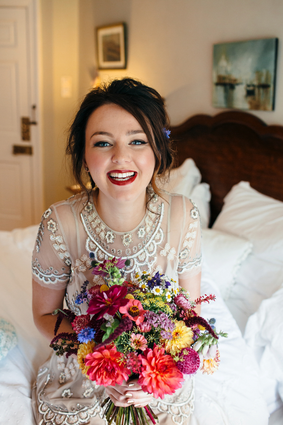 Emily wore a Needle & Thread dress for her colourful, balloon and glitter filled wedding at Coombe Trenchard. Images by Freckle Photography.