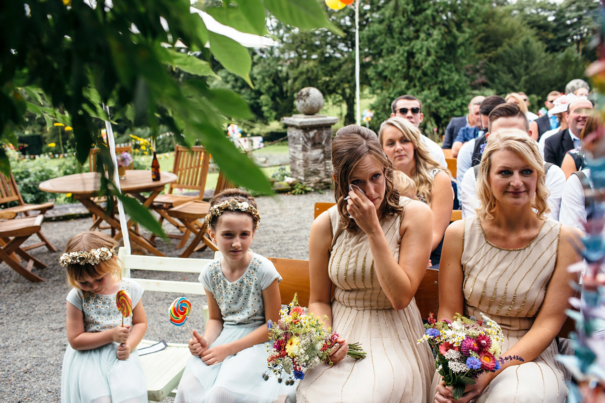 Emily wore a Needle & Thread dress for her colourful, balloon and glitter filled wedding at Coombe Trenchard. Images by Freckle Photography.