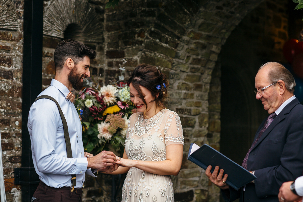 Emily wore a Needle & Thread dress for her colourful, balloon and glitter filled wedding at Coombe Trenchard. Images by Freckle Photography.